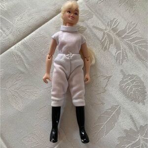 Elegant Women's White Jumpsuit with Black Boots